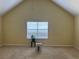 Bedroom featuring a vaulted ceiling, window with blinds, and neutral walls at 4312 Defoors Farm Trl, Powder Springs, GA 30127