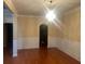 Elegant dining room with hardwood floors and a stunning chandelier, perfect for entertaining at 4312 Defoors Farm Trl, Powder Springs, GA 30127