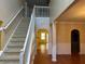 Spacious foyer with staircase and hardwood flooring at 4312 Defoors Farm Trl, Powder Springs, GA 30127