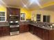 Eat in kitchen with stainless appliances and granite countertops at 4312 Defoors Farm Trl, Powder Springs, GA 30127