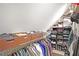 Spacious walk-in closet with built-in shelving and ample storage space for clothes and accessories at 1421 Eryn Cir, Suwanee, GA 30024