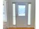 Bright foyer featuring a decorative glass front door and sidelights at 3595 Ennfield Ln, Duluth, GA 30096