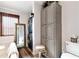 The powder room features a tall, slender cabinet as well as the washer and dryer at 1370 A Cronic Town Rd, Auburn, GA 30011