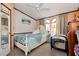 Cozy bedroom with neutral walls, light-colored carpet, and an overhead fan at 1370 A Cronic Town Rd, Auburn, GA 30011