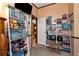 Playroom featuring built-in shelving, overhead lighting, and neutral walls with trim at 1370 A Cronic Town Rd, Auburn, GA 30011