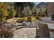 Beautiful backyard with stone steps, outdoor seating and landscaping at 5650 Copper Creek Pass, Cumming, GA 30040