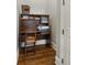 Hallway home office nook with desk, chair, and wood floors at 5650 Copper Creek Pass, Cumming, GA 30040