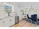 Modern kitchen with stainless steel appliances and an adjacent dining area at 1901 Lullwater Cir, Jonesboro, GA 30236