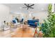 Bright and airy living room featuring modern furnishings and hardwood floors at 1901 Lullwater Cir, Jonesboro, GA 30236