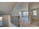 Hallway with railing leading to an additional room at 208 Chiswick Loop, Stockbridge, GA 30281