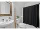 Cozy bathroom featuring a modern vanity, neutral tones, and a stylish mirror at 3908 Charleston Market St, Suwanee, GA 30024