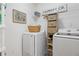 Neat laundry room featuring modern appliances and organized storage solutions at 3908 Charleston Market St, Suwanee, GA 30024