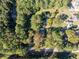 Aerial shot of wooded homesite; gorgeous trees offer shade and privacy at 724 Se Cowan Se Rd, Conyers, GA 30094