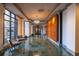 Inviting hallway with marble floors, large windows, and comfortable seating at 795 Hammond Dr # 1812, Atlanta, GA 30328