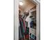 Walk-in closet with clothing racks, built-in shelving, and lots of storage space at 795 Hammond Dr # 1812, Atlanta, GA 30328