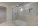 Bathroom featuring large glass shower with gray tile at 246 Arnewood Cir, Mcdonough, GA 30253