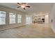 Open concept showcasing the kitchen flowing into the living room with great natural light at 246 Arnewood Cir, Mcdonough, GA 30253