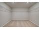 Empty walk-in closet with carpet and wire shelving at 246 Arnewood Cir, Mcdonough, GA 30253