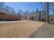 A view of a well-maintained house with a neat front yard at 2550 Belaire Dr, Cumming, GA 30041