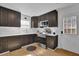 Contemporary kitchen with modern appliances, and a white door to the back at 2550 Belaire Dr, Cumming, GA 30041