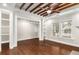 Hardwood floors and built-in shelves define this inviting living room with lots of natural light at 1106 Sanders Se Ave, Atlanta, GA 30316