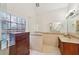 Main bathroom features a large walk-in shower, granite counters, and decorative lighting at 1625 Watercrest Dr, Cumming, GA 30041