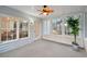 Bright sunroom with natural light, and access to the outdoors at 1625 Watercrest Dr, Cumming, GA 30041