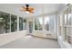 Sunroom with many windows providing lots of natural light at 1625 Watercrest Dr, Cumming, GA 30041