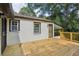 Covered back porch and wooden deck, blending indoor comfort with outdoor enjoyment at 169 Wadley Nw St, Atlanta, GA 30314