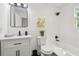 Bathroom showcasing a modern vanity, subway tile shower, and sleek fixtures at 169 Wadley Nw St, Atlanta, GA 30314