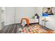 Bedroom showcasing natural light, hard surface flooring and artistic wall decor at 169 Wadley Nw St, Atlanta, GA 30314