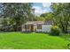 Well-maintained front yard with a beautifully updated home and a cozy carport at 169 Wadley Nw St, Atlanta, GA 30314