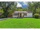 Charming single-story home with fresh green lawn and carport at 169 Wadley Nw St, Atlanta, GA 30314
