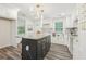 Stylish kitchen featuring a central island, modern appliances, and sleek finishes at 169 Wadley Nw St, Atlanta, GA 30314