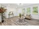 Cozy living room with contemporary decor, natural light, and sleek flooring at 169 Wadley Nw St, Atlanta, GA 30314