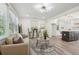 Bright living room with modern lighting, neutral colors and wood flooring at 169 Wadley Nw St, Atlanta, GA 30314