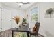 Home office featuring a desk and chair with a large window at 169 Wadley Nw St, Atlanta, GA 30314