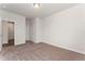 Bright bedroom boasts neutral carpet and two entry ways at 3218 Hidden Valley Cir, Lawrenceville, GA 30044