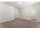 Spacious carpeted bedroom with neutral walls and direct access to a walk-in closet at 3218 Hidden Valley Cir, Lawrenceville, GA 30044