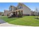 Charming two-story home with landscaped front yard, a welcoming entrance, and ample parking at 3218 Hidden Valley Cir, Lawrenceville, GA 30044
