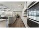 Spacious kitchen with stainless steel appliances, granite countertops and open floor plan at 3218 Hidden Valley Cir, Lawrenceville, GA 30044