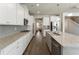 This kitchen is equipped with modern stainless steel appliances, granite counters and white cabinets at 3218 Hidden Valley Cir, Lawrenceville, GA 30044