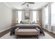 Bedroom featuring hardwood floors, recessed lighting, and neutral colored walls and decor at 472 Burton Dr, Alpharetta, GA 30009