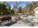 A spacious wooden deck with a railing overlooking the yard at 2190 Rugby Ave, Atlanta, GA 30337