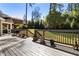 A spacious wooden deck with a railing overlooking the yard at 2190 Rugby Ave, Atlanta, GA 30337