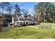 Beautiful two-story home with manicured lawn, mature trees, and a welcoming front porch at 2190 Rugby Ave, Atlanta, GA 30337