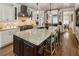 Well-lit kitchen featuring custom cabinets, granite countertops, and stainless steel appliances at 2190 Rugby Ave, Atlanta, GA 30337