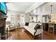 Bright living room with hardwood floors, and cozy seating at 2190 Rugby Ave, Atlanta, GA 30337