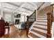 Elegant living room with fireplace, coffered ceiling, and hardwood floors at 2190 Rugby Ave, Atlanta, GA 30337