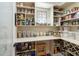 Organized walk-in pantry with ample shelving and storage space for food and supplies at 2190 Rugby Ave, Atlanta, GA 30337